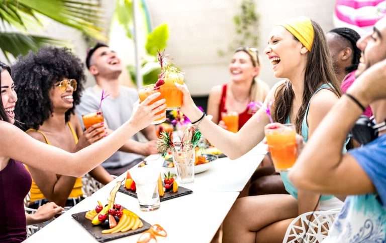 Friends Enjoying Mocktails at a Table