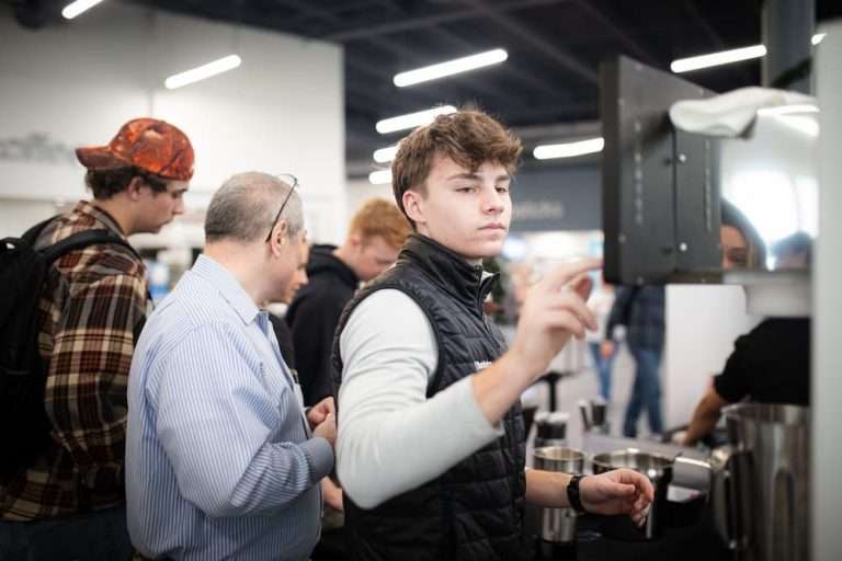 boy using foodservice automation machine.