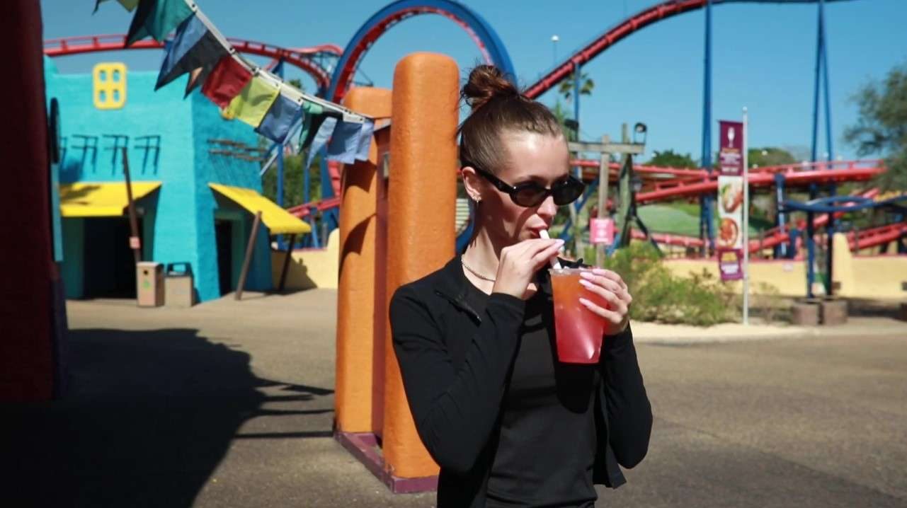 Guest Trying the Boba at Theme Park